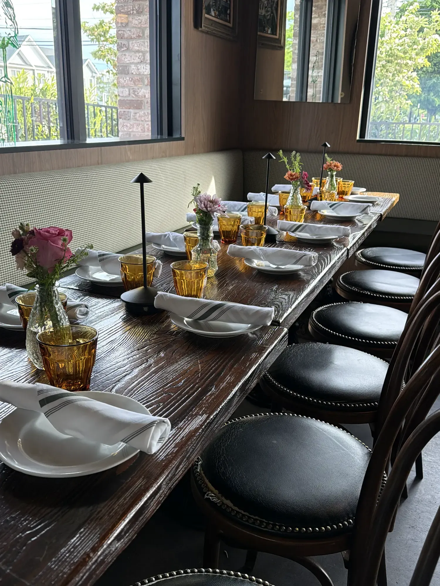 Long communal table set for a private event at Roto All Day